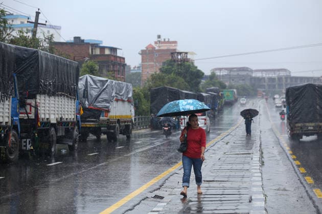 Red Alert Issued In Parts Of Nepal As Landslide Blocks Highways, Water Level Surge High Following Incessant Rainfall Heavy vehicles and trucks are parked along the Ring-road highway in Kathmandu, on September 25, 2026, after landslides blocked major highways and exit points from the capital following days of continuous rainfall. The Weather Forecasting Division under the Department of Hydrology and Meteorology (DHM) issued a five-day special weather warning bulletin, advising the public and agencies to remain alert on Friday and Saturday as rainfall and weather-related hazards are expected to increase across the country. In Kathmandu, the Bagmati River has swollen and breached its embankments following more than 36 hours of continuous rainf  Copyright: xSubaasxShresthax originalFilename: shrestha-redalert260925_npXUK.jpg