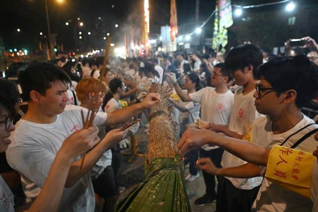 RECORD DATE NOT STATED Hong Kong Pok Fu Lam Village Fire Dragon 2026 Performers during a fire dragon dance performance in Pok Fu Lam Village at Mid-autumn Festival on September 25, 2026 in Hong Kong. (Photo by Kobe Li Nexpher Images) Hong Kong