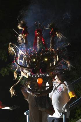 RECORD DATE NOT STATED Hong Kong Pok Fu Lam Village Fire Dragon 2026 A man holding up the head of a Fire Dragon into the sea during a fire dragon dance performance in Wah Fu Estate at Mid-autumn Festival on September 25, 2026 in Hong Kong. (Photo by Kobe Li Nexpher Images) Hong Kong