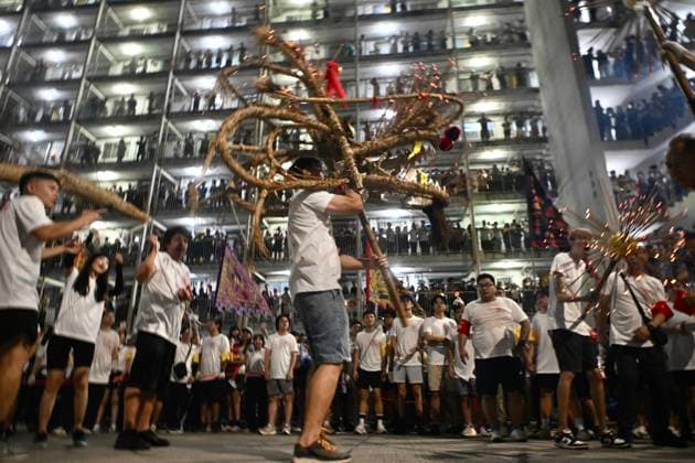 RECORD DATE NOT STATED Hong Kong Pok Fu Lam Village Fire Dragon 2026 Performers performing the fire dragon dance in Wah Fu Estate at Mid-autumn Festival on September 25, 2026 in Hong Kong. (Photo by Kobe Li Nexpher Images) Hong Kong