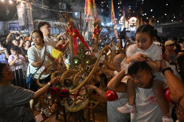 RECORD DATE NOT STATED Hong Kong Pok Fu Lam Village Fire Dragon 2026 Performers during a fire dragon dance performance in Pok Fu Lam Village at Mid-autumn Festival on September 25, 2026 in Hong Kong. (Photo by Kobe Li Nexpher Images) Hong Kong
