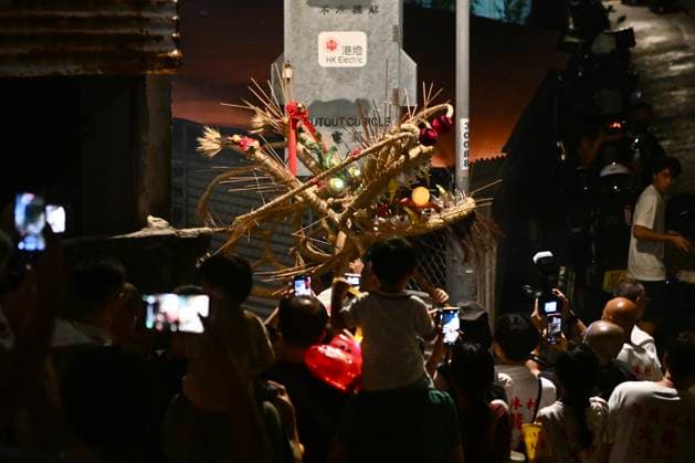 RECORD DATE NOT STATED Hong Kong Pok Fu Lam Village Fire Dragon 2026 Performers during a fire dragon dance performance in Pok Fu Lam Village at Mid-autumn Festival on September 25, 2026 in Hong Kong. (Photo by Kobe Li Nexpher Images) Hong Kong