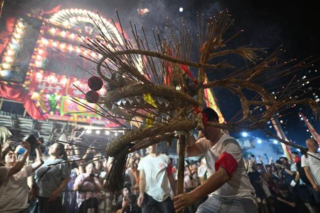 RECORD DATE NOT STATED Hong Kong Pok Fu Lam Village Fire Dragon 2026 Performers performing the fire dragon dance in Wah Fu Estate at Mid-autumn Festival on September 25, 2026 in Hong Kong. (Photo by Kobe Li Nexpher Images) Hong Kong
