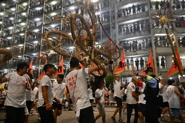 RECORD DATE NOT STATED Hong Kong Pok Fu Lam Village Fire Dragon 2026 Performers performing the fire dragon dance in Wah Fu Estate at Mid-autumn Festival on September 25, 2026 in Hong Kong. (Photo by Kobe Li Nexpher Images) Hong Kong