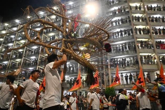 RECORD DATE NOT STATED Hong Kong Pok Fu Lam Village Fire Dragon 2026 Performers performing the fire dragon dance in Wah Fu Estate at Mid-autumn Festival on September 25, 2026 in Hong Kong. (Photo by Kobe Li Nexpher Images) Hong Kong