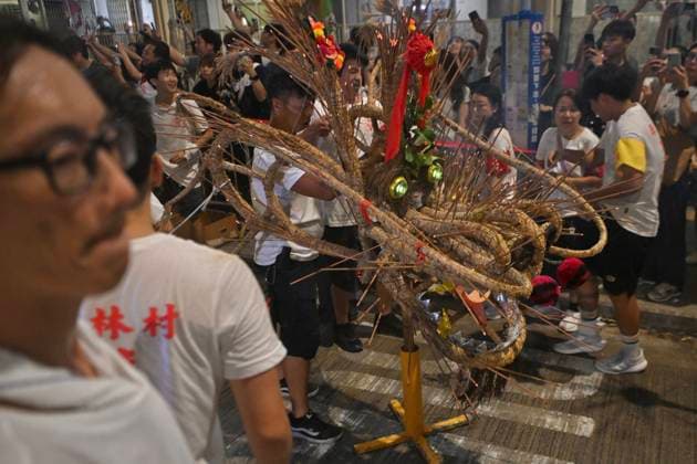 RECORD DATE NOT STATED Hong Kong Pok Fu Lam Village Fire Dragon 2026 Performers performing the fire dragon dance in Wah Fu Estate at Mid-autumn Festival on September 25, 2026 in Hong Kong. (Photo by Kobe Li Nexpher Images) Hong Kong