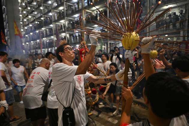 RECORD DATE NOT STATED Hong Kong Pok Fu Lam Village Fire Dragon 2026 Performers performing the fire dragon dance in Wah Fu Estate at Mid-autumn Festival on September 25, 2026 in Hong Kong. (Photo by Kobe Li Nexpher Images) Hong Kong