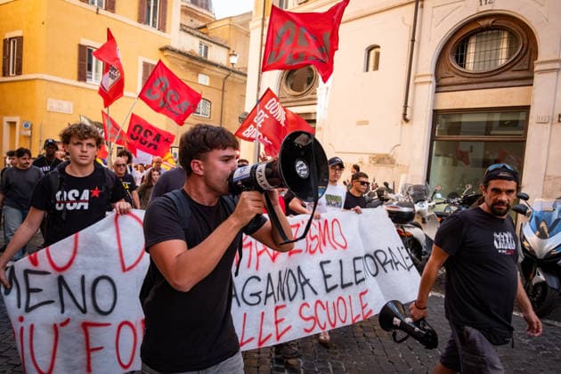 September 25, 2026, Rome, Rm, Italy: Students are taking to the streets to march on Montecitorio - Chamber of Deputies - to protest the new school decree-law issued yesterday by the Meloni government, arguing that the real issues facing schools lie elsewhere. Students call it the Racism Decree because it establishes, among other things, a cap on the number of foreign students per class and bans the wearing of the niqab and burqa during lessons. No to the Racism Decree. Less election campaigning, more funding for schools reads the banner. Rome Italy - ZUMAg256 20260925_znp_g256_008 Copyright: xMarcoxDixGianvitox