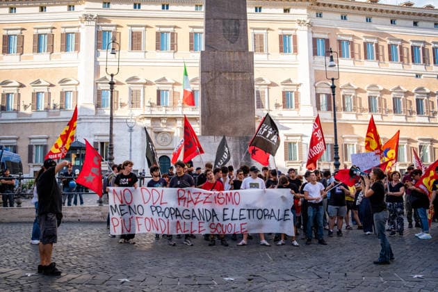 September 25, 2026, Rome, Rm, Italy: Students are taking to the streets to march on Montecitorio - Chamber of Deputies - to protest the new school decree-law issued yesterday by the Meloni government, arguing that the real issues facing schools lie elsewhere. Students call it the Racism Decree because it establishes, among other things, a cap on the number of foreign students per class and bans the wearing of the niqab and burqa during lessons. No to the Racism Decree. Less election campaigning, more funding for schools reads the banner. Rome Italy  - ZUMAg256 20260925_znp_g256_003 Copyright: xMarcoxDixGianvitox