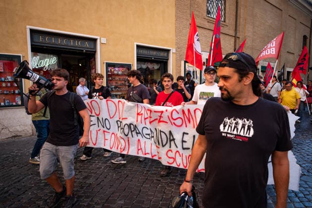 September 25, 2026, Rome, Rm, Italy: Students are taking to the streets to march on Montecitorio - Chamber of Deputies - to protest the new school decree-law issued yesterday by the Meloni government, arguing that the real issues facing schools lie elsewhere. Students call it the Racism Decree because it establishes, among other things, a cap on the number of foreign students per class and bans the wearing of the niqab and burqa during lessons. No to the Racism Decree. Less election campaigning, more funding for schools reads the banner. Rome Italy  - ZUMAg256 20260925_znp_g256_004 Copyright: xMarcoxDixGianvitox