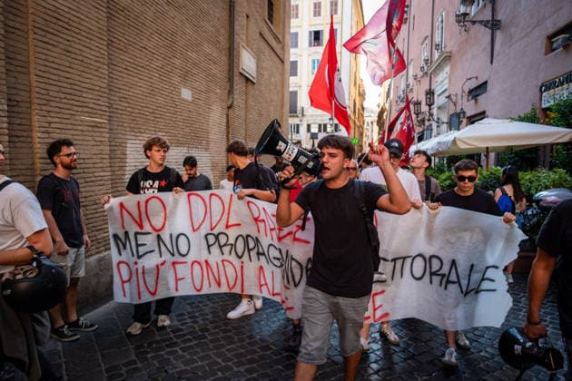 September 25, 2026, Rome, Rm, Italy: Students are taking to the streets to march on Montecitorio - Chamber of Deputies - to protest the new school decree-law issued yesterday by the Meloni government, arguing that the real issues facing schools lie elsewhere. Students call it the Racism Decree because it establishes, among other things, a cap on the number of foreign students per class and bans the wearing of the niqab and burqa during lessons. No to the Racism Decree. Less election campaigning, more funding for schools reads the banner. Rome Italy  - ZUMAg256 20260925_znp_g256_006 Copyright: xMarcoxDixGianvitox