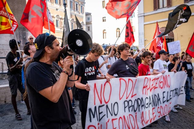 September 25, 2026, Rome, Rm, Italy: Students are taking to the streets to march on Montecitorio - Chamber of Deputies - to protest the new school decree-law issued yesterday by the Meloni government, arguing that the real issues facing schools lie elsewhere. Students call it the Racism Decree because it establishes, among other things, a cap on the number of foreign students per class and bans the wearing of the niqab and burqa during lessons. No to the Racism Decree. Less election campaigning, more funding for schools reads the banner. Rome Italy  - ZUMAg256 20260925_znp_g256_010 Copyright: xMarcoxDixGianvitox