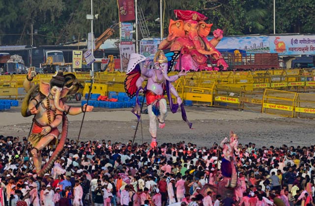 MUMBAI, INDIA - SEPTEMBER 25: Lord Ganesh immersion procession at Girgoan CHowphatty on September 25, 2026 in Mumbai, India. (Photo by Anshuman Poyrekar Hindustan Times) Lord Ganesh Idol Immersion In Mumbai