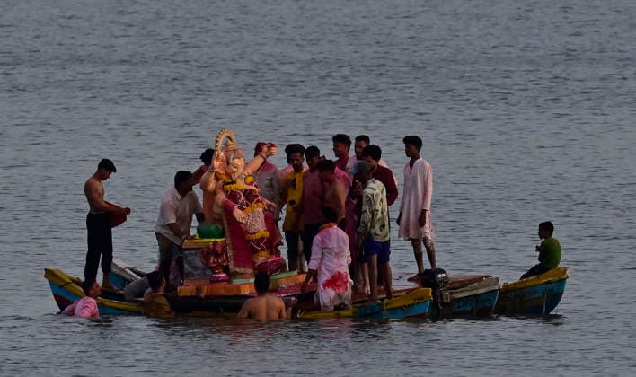 MUMBAI, INDIA - SEPTEMBER 25: Lord Ganesh immersion procession at Girgoan CHowphatty on September 25, 2026 in Mumbai, India. (Photo by Anshuman Poyrekar Hindustan Times) Lord Ganesh Idol Immersion In Mumbai