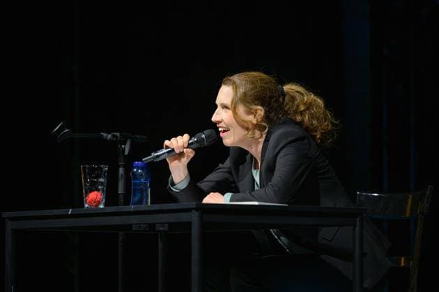Christine Prayon at the Kulturbeutel Festival in Speyer, Speyer, Germany, September 25, 2026. Cabaret artist Christine Prayon, leaning over the table with a smile during her show Farewell Tour at the opening of the Kulturbeutel Festival in the Alter Stadtsaal.