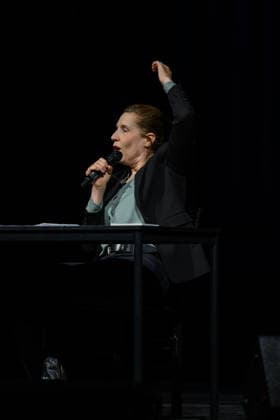 Christine Prayon at the Kulturbeutel Festival in Speyer, Speyer, Germany, September 25, 2026. Comedian Christine Prayon with her arm raised during her show Farewell Tour at the opening of the Kulturbeutel Festival in the Alter Stadtsaal.