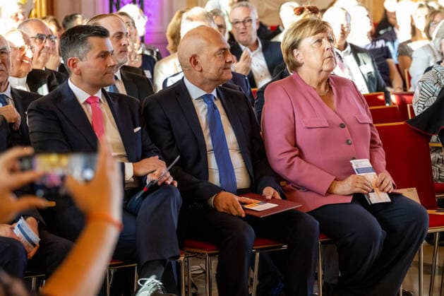 Augsburg, Bavaria, Germany September 25, 2026: Former German Chancellor Angela Merkel (CDU) at the Caritas Elisabeth Prize award ceremony in the Golden Hall of Augsburg City Hall. Mayor of Augsburg Dr. Florian Freund (SPD), Caritas Director Markus Müller, and Dr. Angela Merkel (CDU)