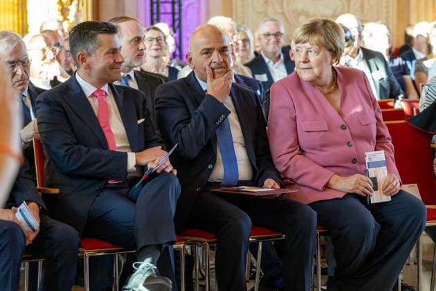 Augsburg, Bavaria, Germany September 25, 2026: Former German Chancellor Angela Merkel (CDU) at the Caritas Elisabeth Prize award ceremony in the Golden Hall of Augsburg City Hall. Mayor of Augsburg Dr. Florian Freund (SPD), Caritas Director Markus Müller, and Dr. Angela Merkel (CDU)