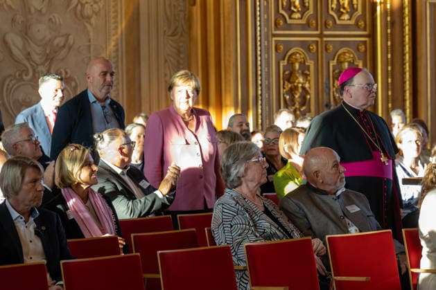 Augsburg, Bavaria, Germany - September 25, 2026: Former Chancellor Angela Merkel (CDU) at the Caritas Elisabeth Prize award ceremony in the Golden Hall of Augsburg City Hall. The former chancellor enters the hall