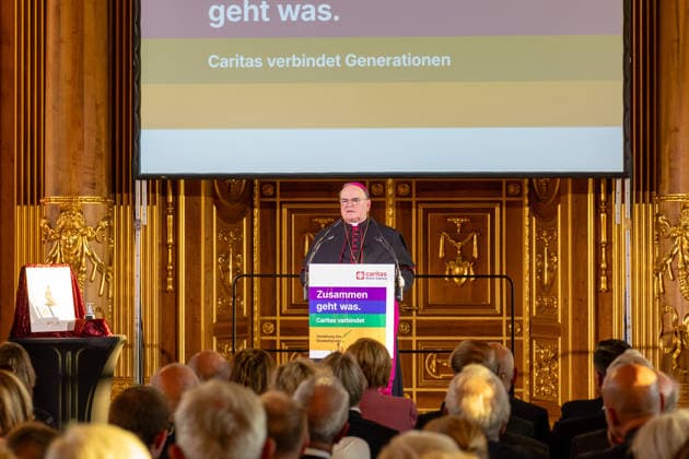 Augsburg, Bavaria, Germany September 25, 2026: Bishop Bertram Meier delivers a speech on Caritas, social cohesion, and intergenerational connections at the Elisabeth Prize award ceremony in the Golden Hall of Augsburg City Hall