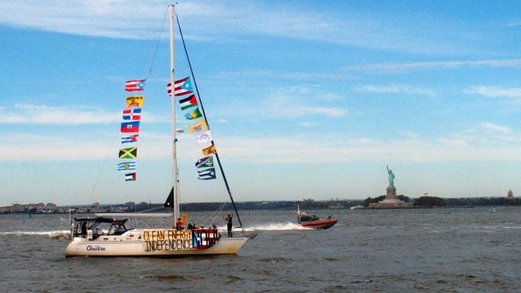 September 25, 2026, Manhattan, New York, U.S.A: New York, New York September 25, 2026..Casa Pueblo protests climate change and wants clean energy. They sailed around Manhattan stopping at Con Edison plant and Big Alice plant in Queens, They cruised by the United Nations and the final stop was in front of the Statue of Liberty.. Clean Energy Now Manhattan U.S.A - ZUMAc272 20260925_znp_c272_009 Copyright: xEmilyxCotlerx