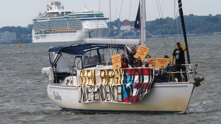 September 25, 2026, Manhattan, New York, U.S.A: New York, New York September 25, 2026..Casa Pueblo protests climate change and wants clean energy. They sailed around Manhattan stopping at Con Edison plant and Big Alice plant in Queens, They cruised by the United Nations and the final stop was in front of the Statue of Liberty.. Clean Energy Now Manhattan U.S.A - ZUMAc272 20260925_znp_c272_017 Copyright: xEmilyxCotlerx