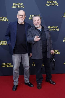 Director Lars Becker and actor Armin Rohde attend the premiere of *Nachtschicht: Sterben verboten* on September 25, 2026, during the 34th Film Festival in Hamburg, Germany. *Nachtschicht* premiere during the 34th Film Festival in Hamburg, Germany