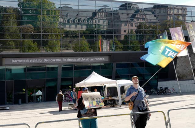 Reichsbürger Rally, September 26, 2026: Participants in the Reichsbürger rally plan to march through downtown Darmstadt carrying flags and historical symbols, despite counter-demonstrations and restrictions. Here, signage at the Darmstadtium in Darmstadt, Hesse, Germany.