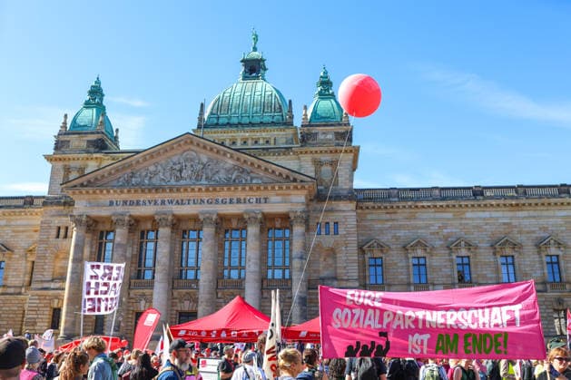 September 26, 2026, Leipzig, Saxony, Germany: Demonstrators take part in a rally in Leipzig, Germany, on September 26, 2026, as part of nationwide trade union-led protests calling for the protection of social welfare, workersÃ¢â‚¬â ¢ rights and social security. Protesters gathered in the city carrying banners, placards and flags, while speakers addressed the crowd about issues including employment, pensions, healthcare and social protection. The demonstration was organized in the context of a nationwide day of action by the German Trade Union Confederation (DGB). The rally brought together workers, trade union members and other participants in central Leipzig Leipzig Germany  - ZUMAc291 20260926_zip_c291_003 Copyright: xMariaxCastrox