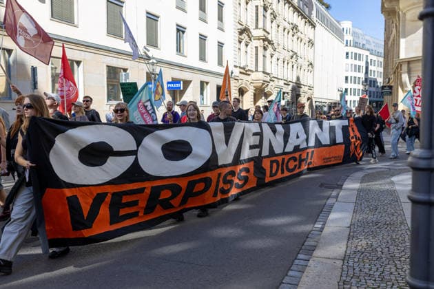 September 26, 2026, Leipzig, Saxony, Germany: Demonstrators participate in an UnkoÂ¼rzbar rally in Leipzig, Germany, on September 26, 2026, protesting cuts to social services and criticizing government spending priorities. Among the signs displayed during the demonstration were messages opposing increased investment in the arms industry and criticizing the Covenant military technology project in Leipzig. Protesters carried banners and placards calling for greater investment in social services and addressing issues including public spending, employment, pensions, healthcare and military expenditure. The demonstration took place in central Leipzig as part of the wider UnkoÂ¼rzbar campaign against cuts to social services. Leipzig Germany  - ZUMAc291 20260926_zip_c291_010 Copyright: xMariaxCastrox