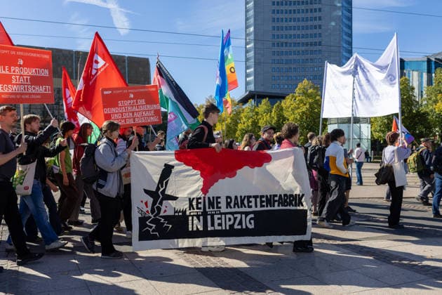 September 26, 2026, Leipzig, Saxony, Germany: Demonstrators participate in an UnkoÂ¼rzbar rally in Leipzig, Germany, on September 26, 2026, protesting cuts to social services and criticizing government spending priorities. Among the signs displayed during the demonstration were messages opposing increased investment in the arms industry and criticizing the Covenant military technology project in Leipzig. Protesters carried banners and placards calling for greater investment in social services and addressing issues including public spending, employment, pensions, healthcare and military expenditure. The demonstration took place in central Leipzig as part of the wider UnkoÂ¼rzbar campaign against cuts to social services. Leipzig Germany - ZUMAc291 20260926_zip_c291_017 Copyright: xMariaxCastrox