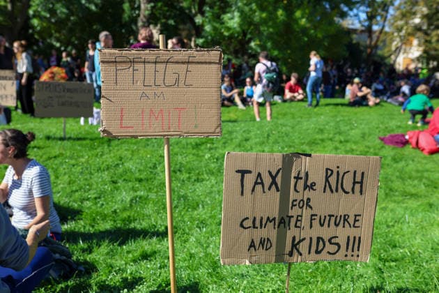 September 26, 2026, Leipzig, Saxony, Germany: Demonstrators participate in an UnkoÂ¼rzbar rally in Leipzig, Germany, on September 26, 2026, protesting cuts to social services and criticizing government spending priorities. Among the signs displayed during the demonstration were messages opposing increased investment in the arms industry and criticizing the Covenant military technology project in Leipzig. Protesters carried banners and placards calling for greater investment in social services and addressing issues including public spending, employment, pensions, healthcare and military expenditure. The demonstration took place in central Leipzig as part of the wider UnkoÂ¼rzbar campaign against cuts to social services. Leipzig Germany - ZUMAc291 20260926_zip_c291_019 Copyright: xMariaxCastrox