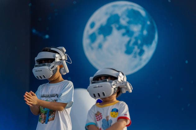 Hong Kong Daily Life Children wearing VR headsets on September 26, 2026 in Hong Kong. (Photo by Vernon Yuen Nexpher Images) HONG KONG