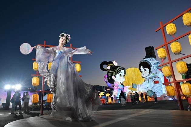 RECORD DATE NOT STATED Hong Kong daily life A performer in traditional Hanfu attire performs in Hung Hom New Waterfront the day after the Mid-Autumn Festival on September 26, 2026 in Hong Kong. (Photo by Kobe Li Nexpher Images) Hong Kong