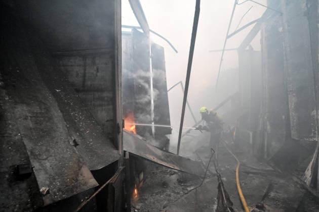 A State Emergency Service rescuer extinguishes a fire at the Central Clothes Market (Anholenko) in Zaporizhzhia, Ukraine, September 26, 2026. The market sustained significant damage in a Russian drone attack. (Photo by Dmytro Smolienko Ukrinform) Russian troops strike clothes market in Zaporizhzhia  Copyright: xDmytroxSmolienkox
