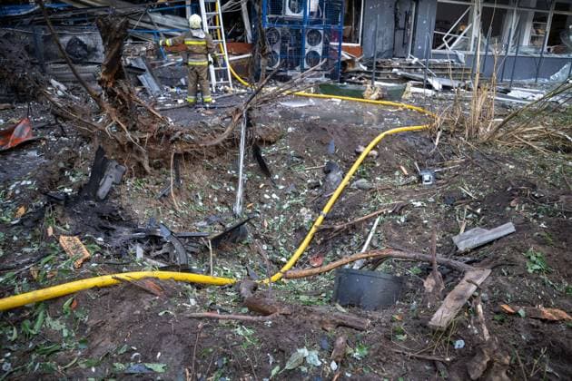 September 26, 2026, Kyiv, Ukraine: KYIV, UKRAINE, SEPTEMBER 26, 2026: Firefighters work at a five-story residential building damaged during a Russian drone attack in KyivÃ¢â‚¬â ¢s Solomianskyi district, as residents watch emergency operations and clear shattered glass from the area. Kyiv authorities said a fire broke out at the residential building and a ground-floor shop following the fall of a drone, injuring four people and prompting rescuers to evacuate 20 residents. Kyiv Ukraine - ZUMAq101 20260926_zna_q101_100 Copyright: xNastassiaxKantorowiczxTorresx