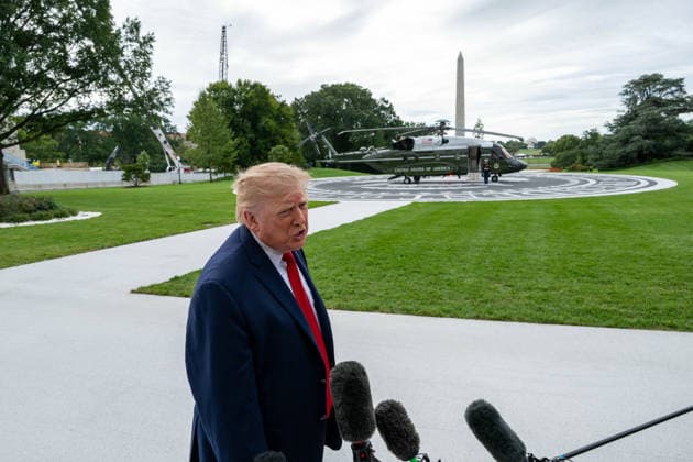 September 26, 2026, Washington, District Of Columbia, United States: President DONALD TRUMP speaks to reporters before departing the White House for Knoxville, Tennessee, where he is scheduled to attend the University of Tennessee vs. University of Texas college football game at Neyland Stadium. Washington United States - ZUMAk206 20260926_znp_k206_005 Copyright: xMattxKaminskyx