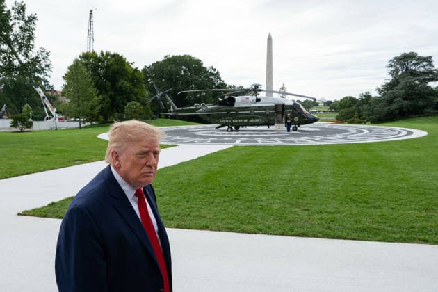 September 26, 2026, Washington, District Of Columbia, United States: President DONALD TRUMP speaks to reporters before departing the White House for Knoxville, Tennessee, where he is scheduled to attend the University of Tennessee vs. University of Texas college football game at Neyland Stadium. Washington United States - ZUMAk206 20260926_znp_k206_008 Copyright: xMattxKaminskyx