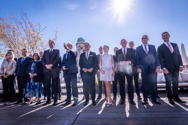 Group photo taken against the light on the rooftop terrace of the Hotel Bayerischer Hof: Alexander Dobrindt, German Federal Minister of the Interior, with his counterparts and international meeting participants. 2nd Munich Migration Meeting: Meeting of European Ministers on the Implementation of the Migration Policy Shift, Munich, Bavaria, Germany, Hotel Bayerischer Hof