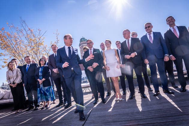 Group photo taken against the light on the rooftop terrace of the Hotel Bayerischer Hof: Alexander Dobrindt, German Federal Minister of the Interior, with his counterparts and international meeting participants. 2nd Munich Migration Meeting: Meeting of European Ministers on the Implementation of the Migration Policy Shift, Munich, Bavaria, Germany, Hotel Bayerischer Hof
