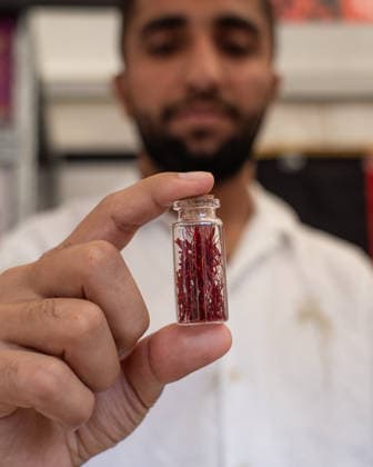 September 26, 2026, Turin, To, Italy: A man with a jar of saffron at the Terra Madre event, the tasting event organized by Slow Food in the city center. Turin, September 26, 2026 Turin Italy  - ZUMAa289 20260926_zia_a289_200 Copyright: xSelenexDanielex xAgfx