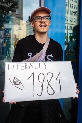 September 26, 2026, Warsaw, Mazovia, Poland: A protester holds a placard alluding to George Orwell s dystopian novel 1984 ..Left-wing antifascist activists gather outside the European Union Commission building in Warsaw to protest against the Chat Control 1.0 legislation recently revived by the European Parliament. The legislation allows for the mass scanning of messages belonging to every European Union citizen for Child Sexual Abuse Material (CSAM) in the name of protecting children s rights and combating pedophilia. The activists, however, believe rights to privacy and the foundations of free speech are being trampled upon, especially with talks due to resume regarding the far more dangerous Chat Control 2.0 bill, which aims to re - ZUMAs197 20260926_aaa_s197_197 Copyright: xNeilxMiltonx