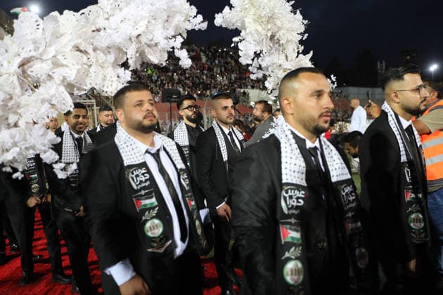 Mass Wedding Brings Together 44 Couples in Dura Brides and grooms take part in a mass wedding ceremony for 44 couples in Dura, near the West Bank city of Hebron, on September 26, 2026. Thousands of family members, residents and friends attended the celebration to mark the weddings. Photo by Mamoun Wazwaz apaimages Hebron West Bank Palestinian Territory 260926_Hebron_MW_1_00(14) Copyright: xapaimagesxMamounxWazwazx xapaimagesx