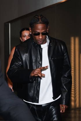 IPA89011578 - Milan, Celebrity Sightings During Milan Fashion Week Women s Collection Spring Summer 2027 - Women s Fashion, Spring Summer 2027. Pictured: Travis Scott (American rapper) leaving the Armani Hotel on his way to the Bottega Veneta fashion show  Copyright: xAlessandroxBremecx xx IPA89011578