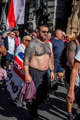 September 26, 2026, London, London, UK: Licensed to London News Pictures. 26 09 2026. London, England. Hundreds of anti-migrant protestors marched to Trafalgar Square to protest against grooming gangs targeting British girls. The event organised by Together For The Children in collaboration with Football Lads on National Survivors Day stands in solidarity with survivors of child sexual abuse and sexual violence while demanding stronger child protections and legal reforms. Photo credit: LNP London UK - ZUMAs197 20260926_aaa_s197_262 Copyright: xLabxMox