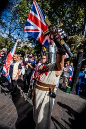 September 26, 2026, London, United Kingdom: An Englishman dressed as a crusader seen during a protest against grooming gangs targeting British girls. The event organised by Together For The Children in collaboration with Football Lads on National Survivors Day stands in solidarity with survivors of child sexual abuse and sexual violence while demanding stronger child protections and legal reforms, as well as a curb on illegal migration. London United Kingdom - ZUMAs197 20260926_aaa_s197_320 Copyright: xLabxMox