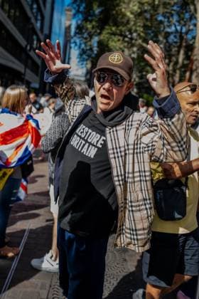 September 26, 2026, London, United Kingdom: An anti-migrant protestor chants slogans during a protest against grooming gangs targeting British girls. The event organised by Together For The Children in collaboration with Football Lads on National Survivors Day stands in solidarity with survivors of child sexual abuse and sexual violence while demanding stronger child protections and legal reforms, as well as a curb on illegal migration. London United Kingdom - ZUMAs197 20260926_aaa_s197_322 Copyright: xLabxMox