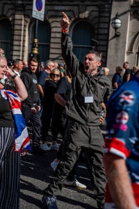 September 26, 2026, London, United Kingdom: An anti-migrant protestor chants slogans during a protest against grooming gangs targeting British girls. The event organised by Together For The Children in collaboration with Football Lads on National Survivors Day stands in solidarity with survivors of child sexual abuse and sexual violence while demanding stronger child protections and legal reforms, as well as a curb on illegal migration. London United Kingdom - ZUMAs197 20260926_aaa_s197_312 Copyright: xLabxMox