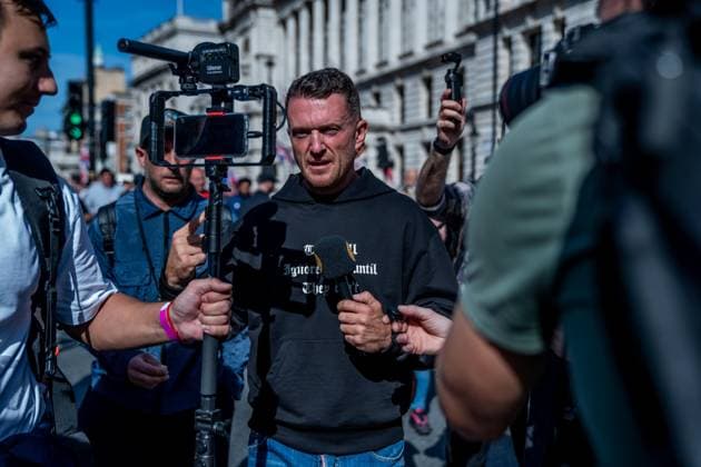 September 26, 2026, London, United Kingdom: Far-right activist Tommy Robinson takes part during a protest against grooming gangs targeting British girls. The event organised by Together For The Children in collaboration with Football Lads on National Survivors Day stands in solidarity with survivors of child sexual abuse and sexual violence while demanding stronger child protections and legal reforms, as well as a curb on illegal migration. London United Kingdom - ZUMAs197 20260926_aaa_s197_307 Copyright: xLabxMox