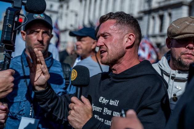 September 26, 2026, London, United Kingdom: Far-right activist Tommy Robinson takes part during a protest against grooming gangs targeting British girls. The event organised by Together For The Children in collaboration with Football Lads on National Survivors Day stands in solidarity with survivors of child sexual abuse and sexual violence while demanding stronger child protections and legal reforms, as well as a curb on illegal migration. London United Kingdom - ZUMAs197 20260926_aaa_s197_308 Copyright: xLabxMox